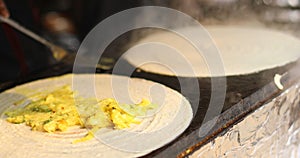 Cooking masala dosa at Surajkund Mela food stall