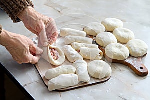 Cooking meat pies at home in the kitchen.