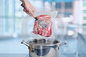 Cooking meat vacuum packed with sous-vide technology