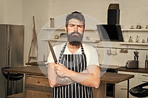 Cooking is my passion. brutal man in cook apron with sharp knife. mature male with beard cooking. culinary business