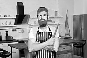 Cooking is my passion. brutal man in cook apron with sharp knife. mature male with beard cooking. culinary business