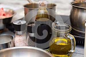 Cooking Oil and Seasonings in Kitchen Setting