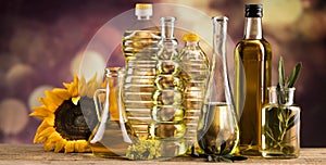 Cooking oils, Olive oil, Rape, Sunflower flowers in bottles