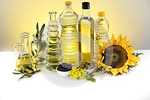 Cooking oils, Olive oil, Rape, Sunflower flowers in bottles