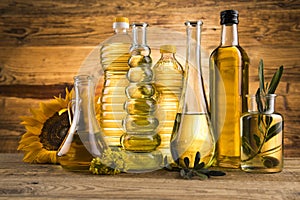 Cooking oils, Olive oil, Rape, Sunflower flowers in bottles