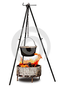 Cooking in old cast-iron on tripod