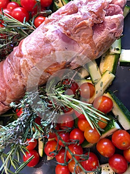 Cooking with only one baking sheet with new dialog oven. Tomatoes, zucchini and meat together on one tray, cooking coincidently.