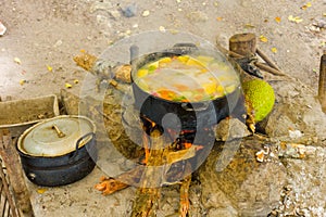 Cooking on an open fire in the tropics photo