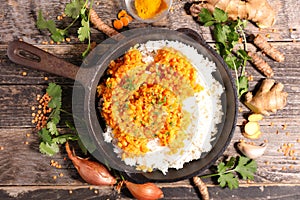 Cooking pan with rice and dal indian photo