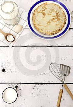 Cooking pancakes. Ingredients, crockery and kitchenware for pancakes