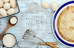 Cooking pancakes. Ingredients, crockery and kitchenware for pancakes