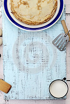 Cooking pancakes. Ingredients, crockery and kitchenware for pancakes