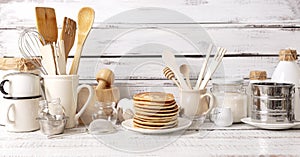 Cooking pancakes. Ingredients, crockery and kitchenware for pancakes