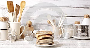 Cooking pancakes. Ingredients, crockery and kitchenware for pancakes