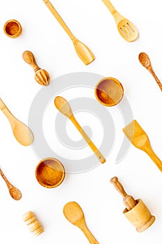 Cooking pattern with wooden kitchen utensils and cookware