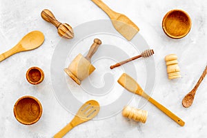 Cooking pattern with wooden kitchen utensils and cookware