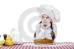 Cooking and people concept - smiling little girl in cook hat