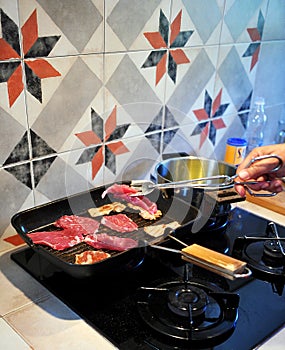 Cooking pork loin steaks in the griddle pan