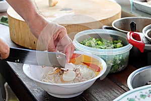 Cooking, Pork noodles with fish ball,hot and sour soup