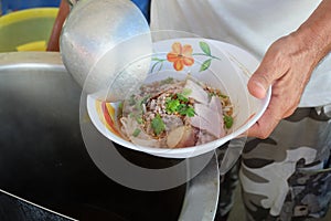 Cooking, Pork noodles with fish ball,hot and sour soup