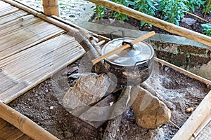 Cooking in a pot over an open fire