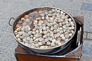 Cooking pot with quail eggs, a deluxe delicacy