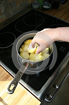 cooking potatoes, boiling photo