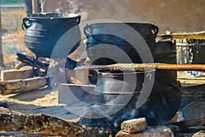 Cooking pots over fire