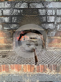 Cooking real pizza in a brick oven