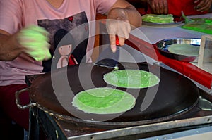 Cooking Roti Saimai (Cotton Candy) or Thai cotton candy burrito