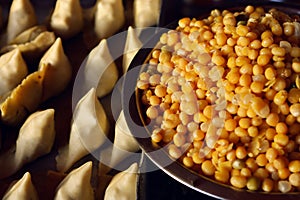 Cooking Samosas with peas in Indian cuisine