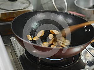 Cooking of sausage fried rice with mixed vegetable