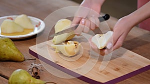 Cooking secrets - extracting the core of a pear or apple with a knife.