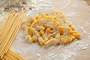 Cooking spaghetti and macaroni at home.