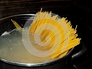 Cooking spaghetti in pot