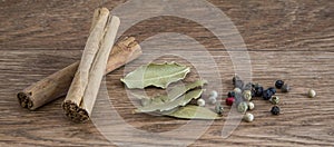 Cooking spices and ingredients on wood