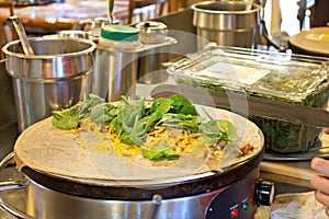 Cooking a Spinach and Cheese Crepe