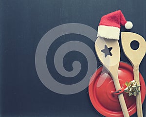 Cooking spoon with hat of santa