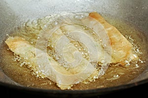 Cooking spring roll as four sheet wrap fried vermicelli and sli