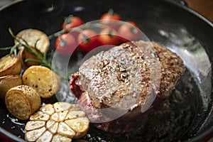 Cooking a steak food photography recipe idea