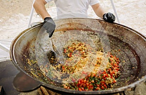 cooking street food uzbek cuisine pilaf  cauldron