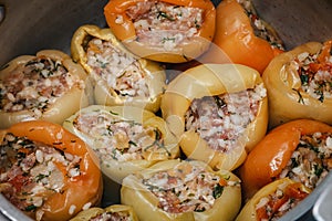 Cooking. Stuffed peppers before stewing