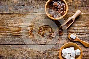 Cooking sweets set with different sugar lumps on rustic table background top view mockup