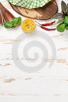 Cooking table with utensils and ingredients