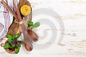 Cooking table with utensils and ingredients