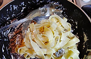 Cooking Tagliatelle Pasta photo