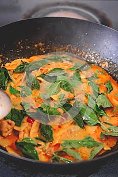 Cooking Thai Chicken Red Curry in the Wok, Thai Food, Thai Cuisine, Thai Famouse Food