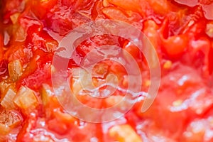 Cooking tomato sauce, closeup steamed vegetables for cook book or food blog background