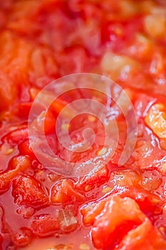 Cooking tomato sauce, closeup steamed vegetables for cook book or food blog background