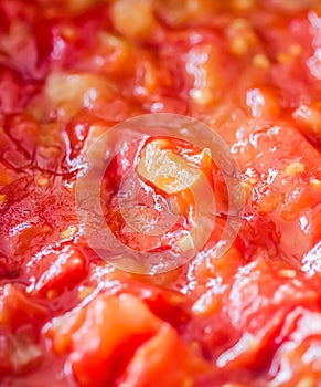 Cooking tomato sauce, closeup steamed vegetables for cook book or food blog background